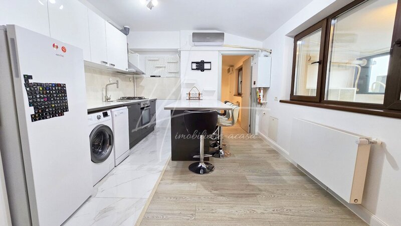 Gheorghe Ionescu Sisesti 59, apartament intim in bloc elegant cu gradina